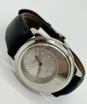 Alfred Dunhill Ltd, London, a gentleman’s stainless steel cased wristwatch, with silvered dial and