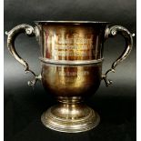 A silver George II twin handled trophy bearing a hallmark for London, Richard Gurney & Thomas Cooke,