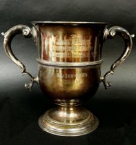 A silver George II twin handled trophy bearing a hallmark for London, Richard Gurney & Thomas Cooke,