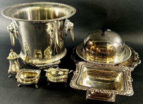 A Vintage Georgian style silver plated ice bucket with lion mask handles, a silver plated three