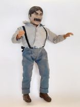 James Bond Moonraker 'Jaws' action figure marked '© Eon Productions Ltd 1979', in original clothing,