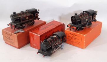 Three clockwork 0 gauge engines by Hornby comprising 2 x No 40 Tank Locomotives boxed with keys, a