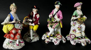 A mixed collection of continental porcelain figure groups, some in an 18th century style including