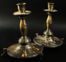 A pair of silver candlesticks (both AF) hallmarks rubbed
