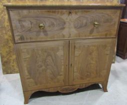 A Georgian mahogany secretaire cabinet with inlaid crossbanded detail and flame veneers, the