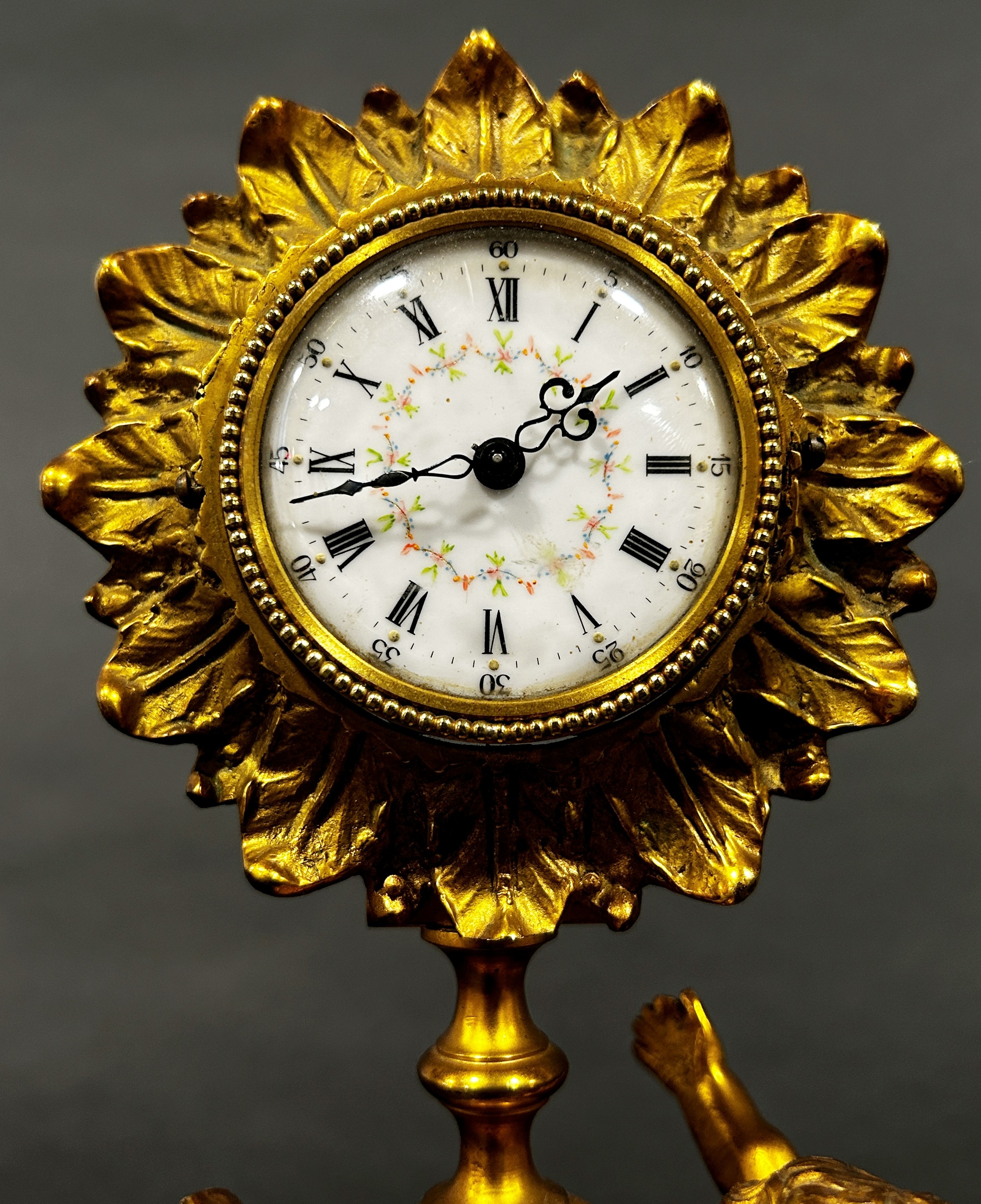 19th century gilt mantle clock the painted dial within a flower head border, surmounted on an onyx - Image 2 of 5