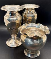 A pair of small silver vases on a weighted base, Birmingham 1919, maker Gorham Manufacturing