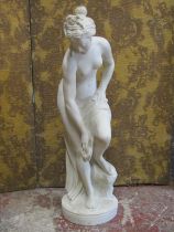 A classical female figure of a bather in resin marble, 85cm high