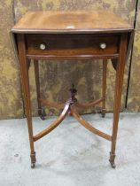 An inlaid Edwardian mahogany oval drop leaf Pembroke table with satin wood cross banding, boxwood