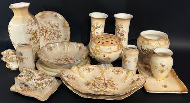 Collection of ceramic Crown Ducal salon wares with exotic bird detail, shaped dishes, vases,