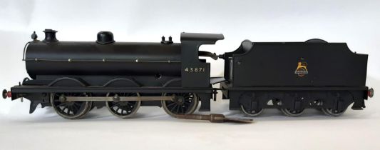 A Bassett-Lowke 0 Gauge clockwork 0-6-0 goods locomotive and tender 43871 with key, in black livery