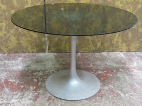 A mid 20th century Chromcraft kitchen dining table the glass plate top raised on a trumpet shaped