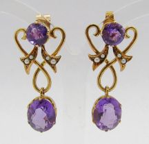 Pair of early 20th century yellow metal amethyst and seed pearl drop earrings in the manner of