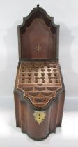 A George III mahogany serpentine cutlery box with ebony and satinwood chevron stringing, and a brass