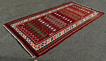 South West Persian Qashgai Kilim with a brightly coloured pattern of seven horizontal interlocking