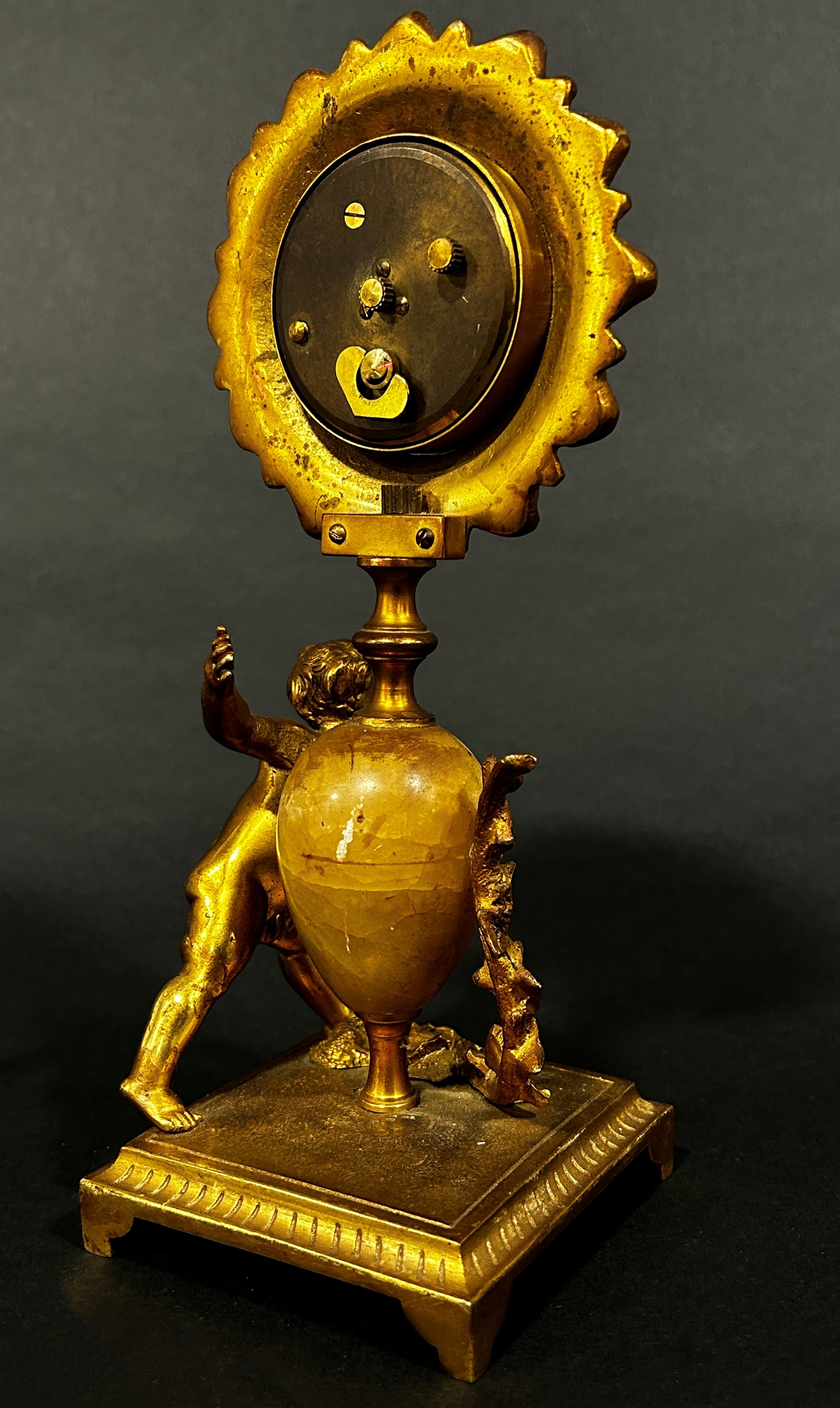 19th century gilt mantle clock the painted dial within a flower head border, surmounted on an onyx - Image 4 of 5