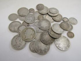 A collection of Victorian silver coinage to include half crowns, florins, shillings, and smaller