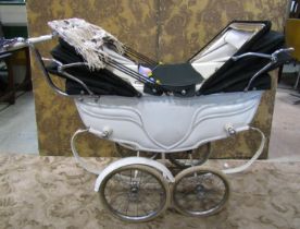 A 1930s Silver Cross child's pram with original white painted and string lined coachwork, unusual