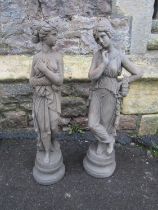 Two small cast composition stone garden/interior ornaments in the form of classical maidens in