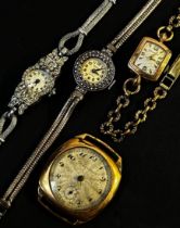 A mixed group early 20th century Swiss and other wristwatches to include three 9ct yellow gold cased