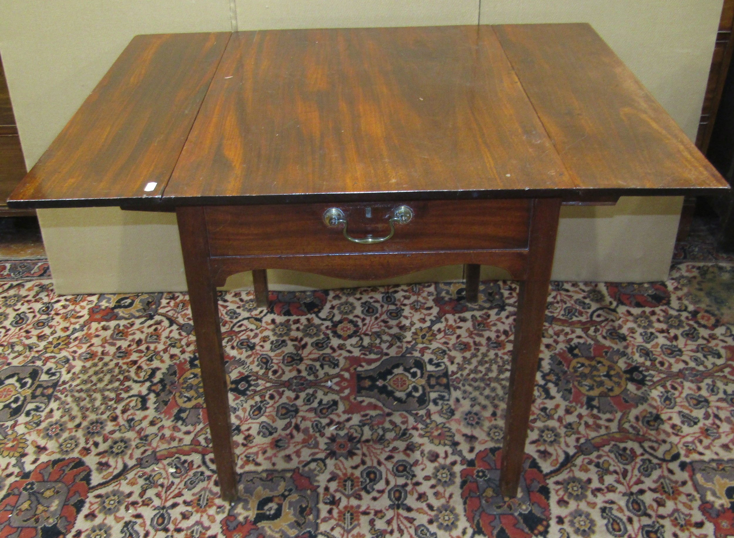 A Georgian mahogany Pembroke table enclosing a frieze drawer on square tapered supports, 80cm long - Image 2 of 3