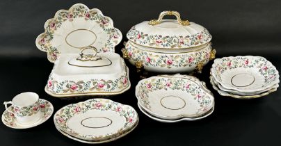 A collection of Derby floral pattern tableware including an oval tureen and cover, shaped dishes,