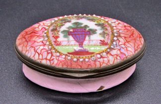 A Georgian pink enamel Bilston box oval with urn and landscape detail