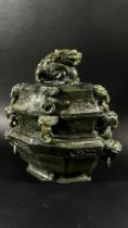 A large archaistic style Chinese spinach green bowenite jade lidded censor, with ringed temple