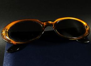A pair of vintage Gucci ladies sunglasses 135 G.G. 2413/f 4NR with hard case, together with a Skagen