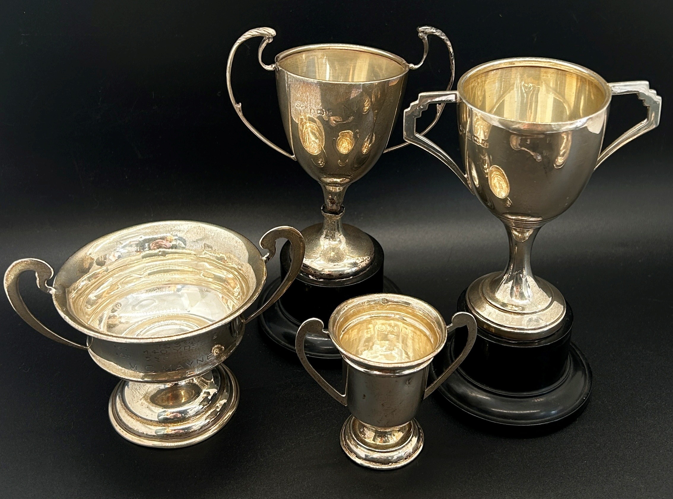 Four small silver trophies, a silver jar lid, two silver spoons, a napkin ring and a bracelet, 8 - Image 2 of 3