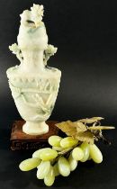 A collection of Chinese carved bowenite jade and other hardstone items to include a large twin-