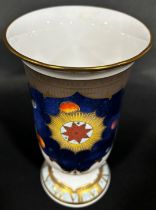 A Royal Worcester trumpet shaped vase, commemorating the Year 2000 millennium with, original box