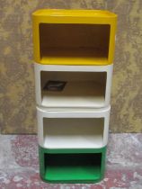An Anna Castelli for Kartell, a modular four tier storage tower (cream, yellow and green) and two