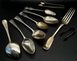 Assorted 19th century silver flatware, mostly spoons for various uses, a fork and two sugar tongs,