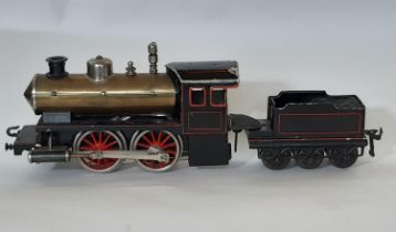 Early 29th century 0 gauge live steam 0-4-0 locomotive and tender by Bing with crazed black and