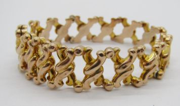 Unusual 9ct fancy X link expanding bracelet, stamped '9 Flexine Patent', 11.4g