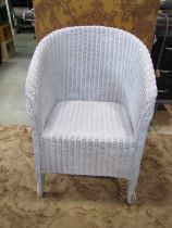 A small Lloyd Loom chair, white painted finish