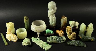 An interesting collection of Chinese carved jade, bowenite jade and hard stone objects to include