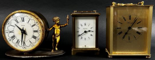 Three assorted reproduction carriage clocks to include a figural example (3)