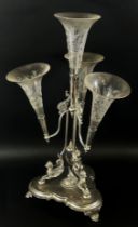 A 19th century silver plated epergne centrepiece with a central fern etched trumpet vase with