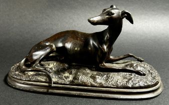 A small bronze recumbent whippet, 21cm wide, together with a bronzed resin study of a Labrador (2)