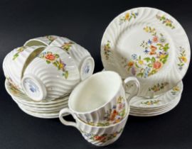 A 19th century part tea service with hand painted repeating floral bands within gilded borders,