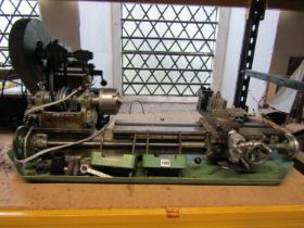 A vintage Myford lathe 109 cm length x 44 depth together with literature