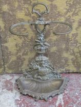 A cast brass umbrella stand with decorative urn, swan and signets within bulrush detail, 67 cm