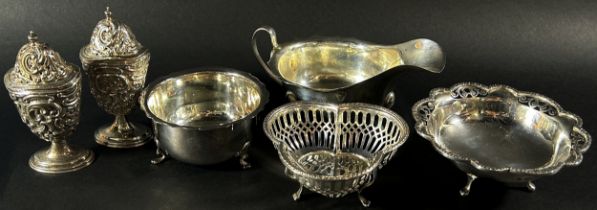 A mixed selection of silver to include Georgian style sauce boat, three bonbon dishes and a pair