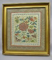 Two 20th century Chinese silk embroideries, depicting floral sprays with ripe fruit and butterflies,