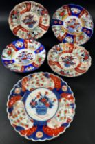 Five Imari plates with hand painted detail and further 19th century floral dessert plate