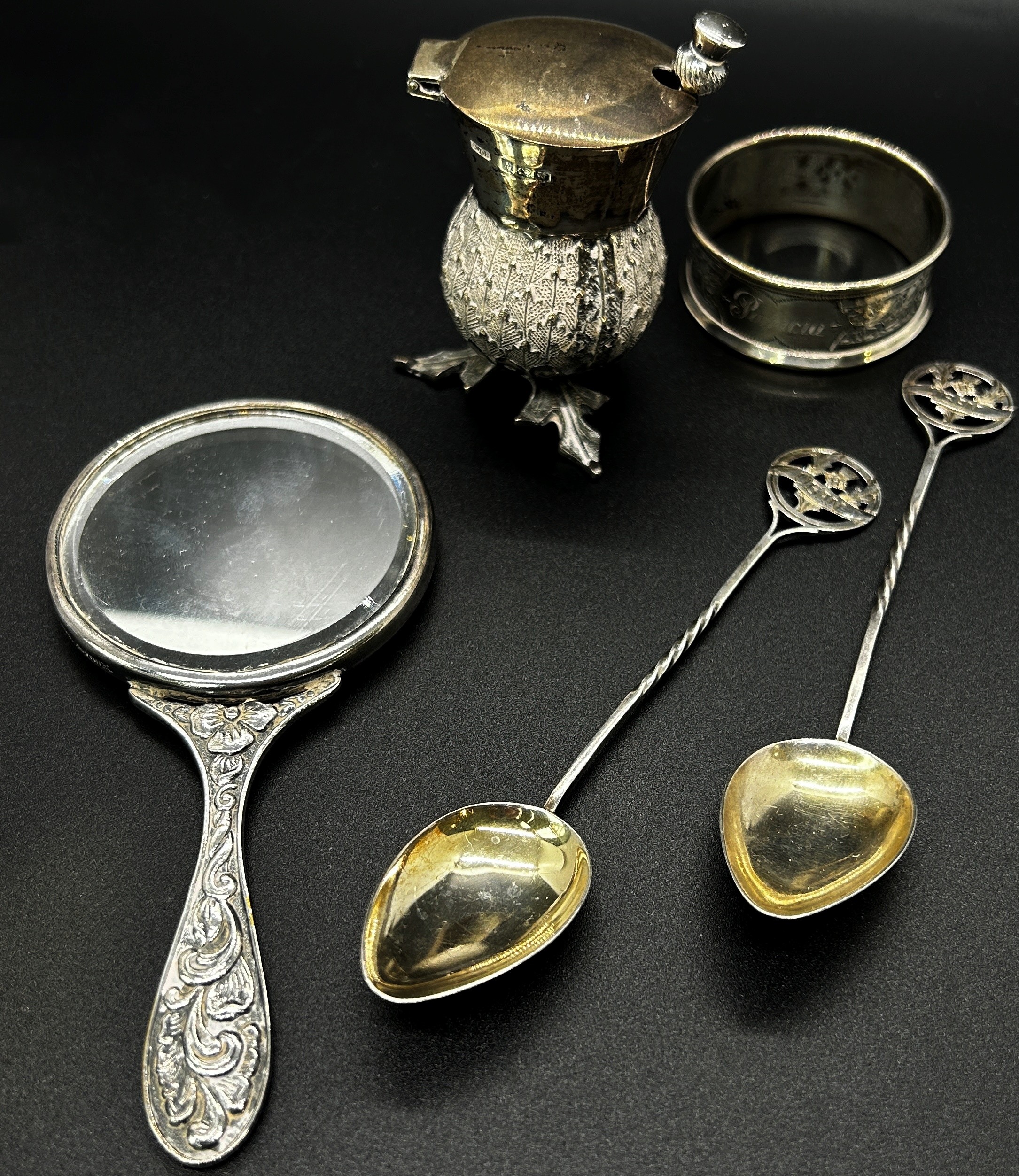 A quantity of silver including a hand mirror, napkin ring, two souvenir spoons, thistle salt pot and - Image 3 of 4
