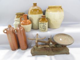 Stoneware flagons and various stoneware storage jars and cast iron scale etc