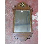 A Chippendale style wall mirror with gilt ho ho bird detail